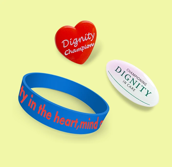 Dignity Champion wristband and badges