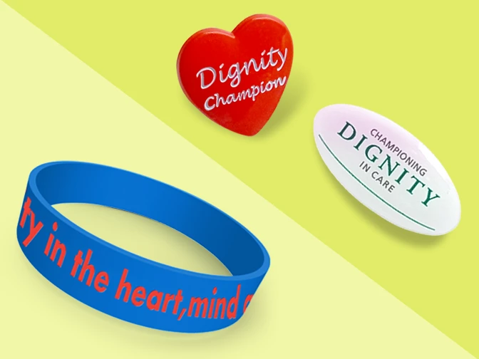 Dignity Champion wristband and badges